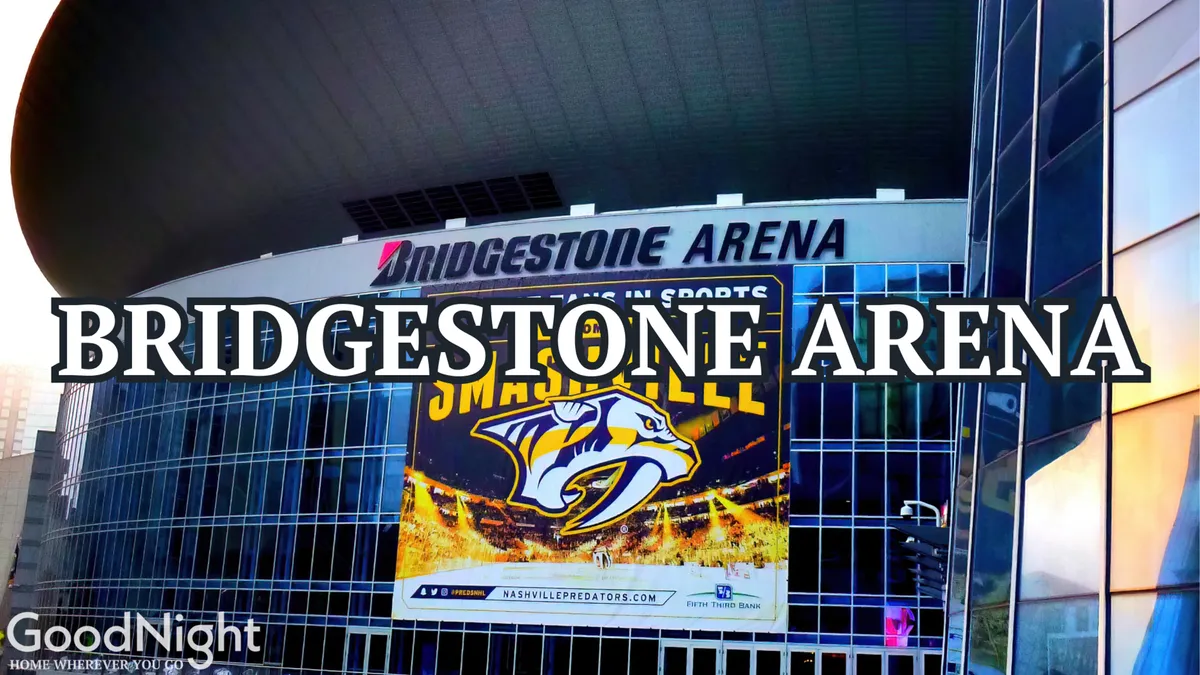 A lively street-level view of Bridgestone Arena with prominent signage and a Nashville Predators banner, bustling with energy. The glass facade gleams, hinting at the excitement of sports events, concerts, and family entertainment just moments away.