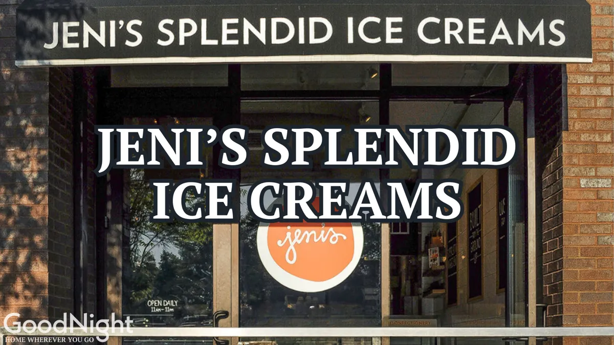 A cheerful storefront with a visible sign and window displays where people are enjoying ice cream and socializing outside on a sunny day. The scene exudes a sense of community and local flavor.